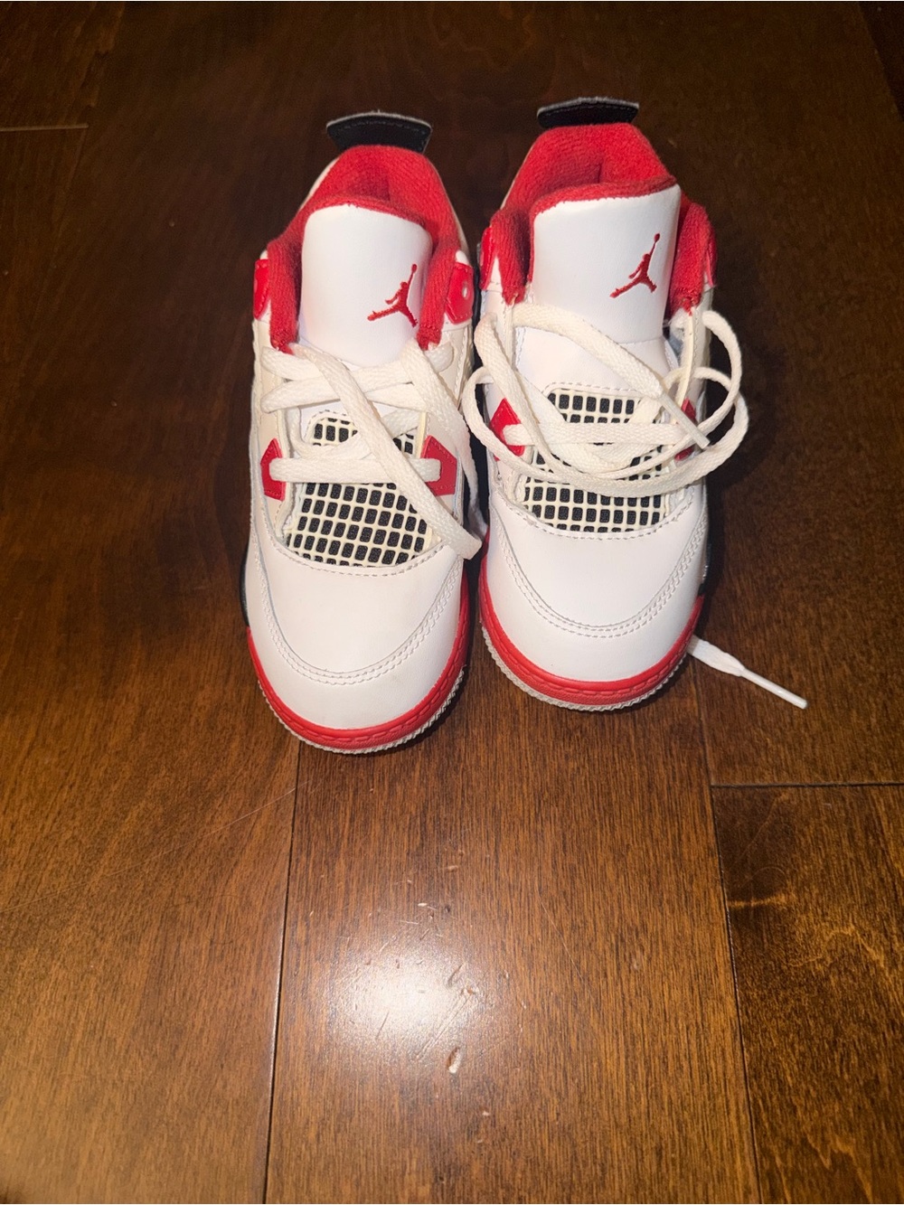 Air Jordan 4 Retros in the “Fire Red” colorway 10C